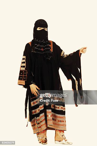 woman wearing burka - burka stock pictures, royalty-free photos & images