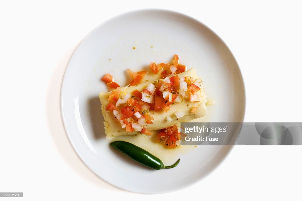 Tamale and Chili Pepper on Plate