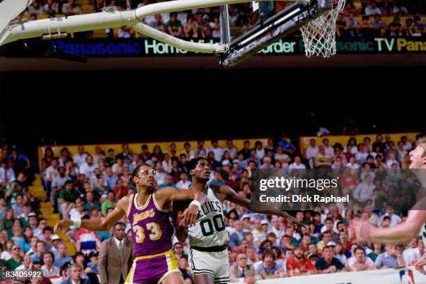 Robert Parish of the Boston Celtics and Kareem Abdul Jabbar of the Los Angeles Lakers battle for position during Game Six of the 1985 NBA Finals...