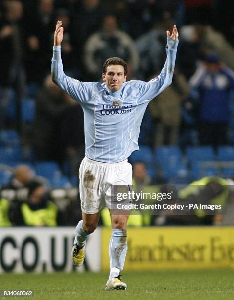 Manchester City's Blumer Elano celebrates scoring the opening goal of the game