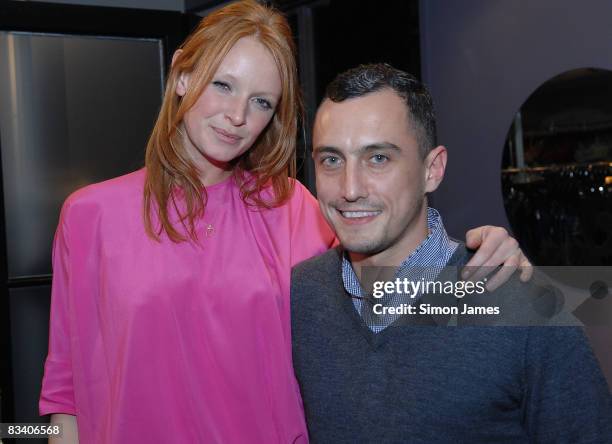 Model Olivia Inge and designer Richard Nicoll attend his Trunk Show Spring Summer 2009 collection at the Liberty store on October 23, 2008 in London,...