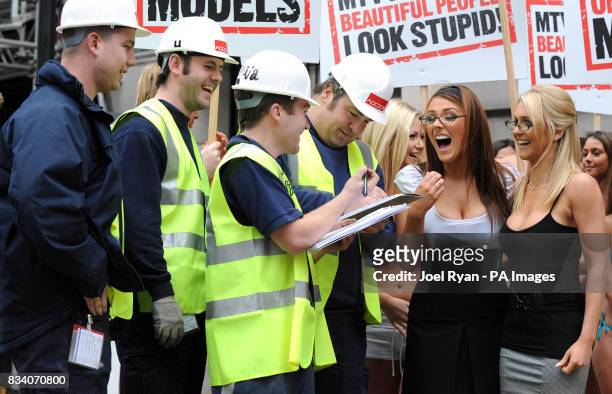 Construction workers sign a petition led by Glamour model Lucy Pinder and FHM High Street Honey winner Kayleigh Pearson as they promote the launch of...