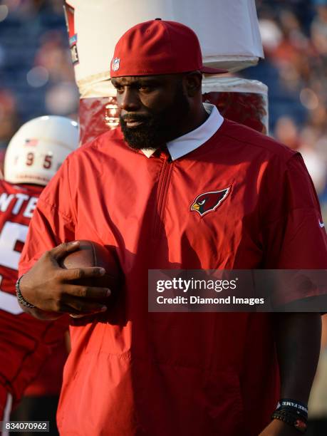 Defensive line coach Brentson Buckner of the Arizona Cardinals directs drills prior to the 2017 Pro Football Hall of Fame Game on August 3, 2017...