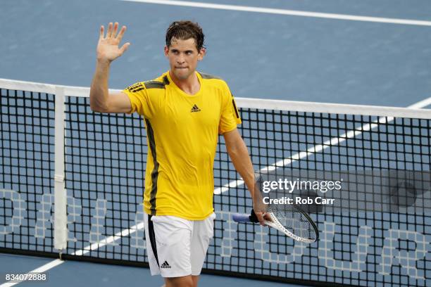 Dominic Thiem of Austria waves after defeating Adrian Mannarino of France during Day 6 of the Western and Southern Open at the Linder Family Tennis...