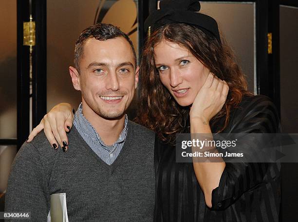 Designer Richard Nicoll and guest attend the Richard Nicoll Trunk Show Spring Summer 2009 collection at the Liberty store on October 23, 2008 in...