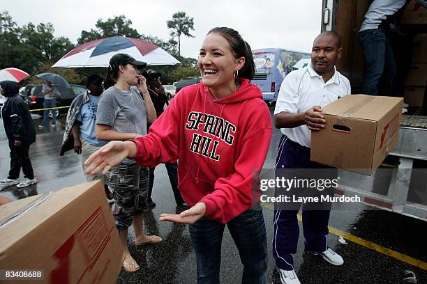 The New Orleans Hornets participate in a food drop in conjunction with Spring Hill College athletes and international hunger relief organization Feed...