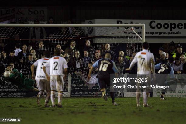 Non-league Havant and Waterlooville FC keeper Kevin Scriven saves a penalty from Swansea FC's Leon Britton during their FA Cup Third Round replay at...