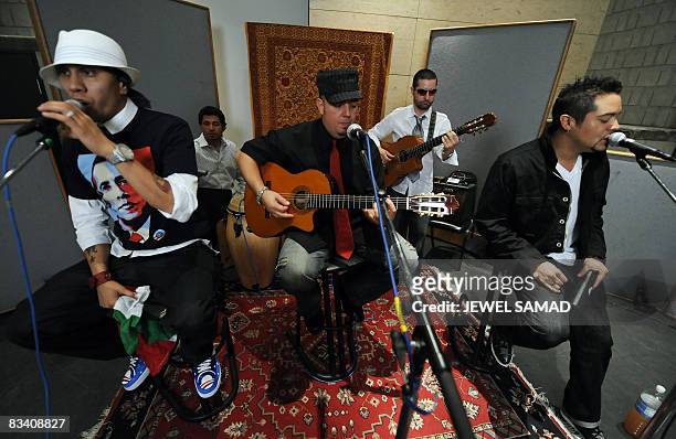Singer Taboo practices with composer and lead guitarist George Pajon Jounior from Black Eyed Peas and Andy Vargas , singer with the band of Carlos...
