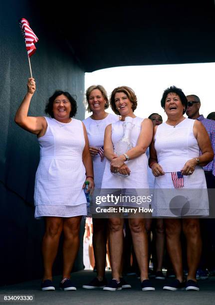 Pat Hurst, Wendy Ward, Juli Inkster, and Nancy Lopez of Team USA smile in the tunnel before they are introduced to the crowd during opening ceremony...