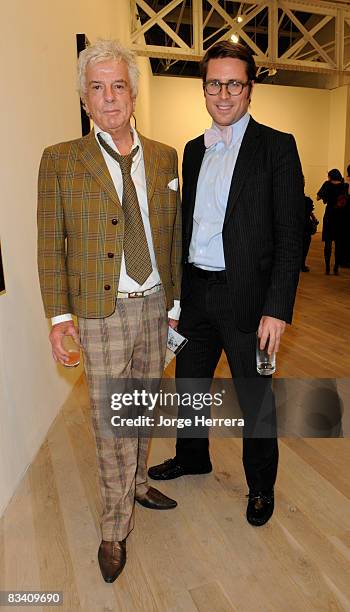 Nicky Haslam and Rodman Primack attend the Annie Leibovitz reception at Phillips de Pury on October 23, 2008 in London, England.