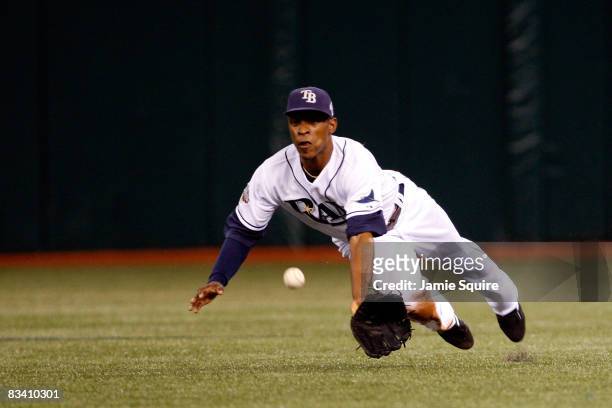 Upton of the Tampa Bay Rays can't make a play on a single hit by Greg Dobbs of the Philadelphia Phillies in the top of the sixth inning during game...