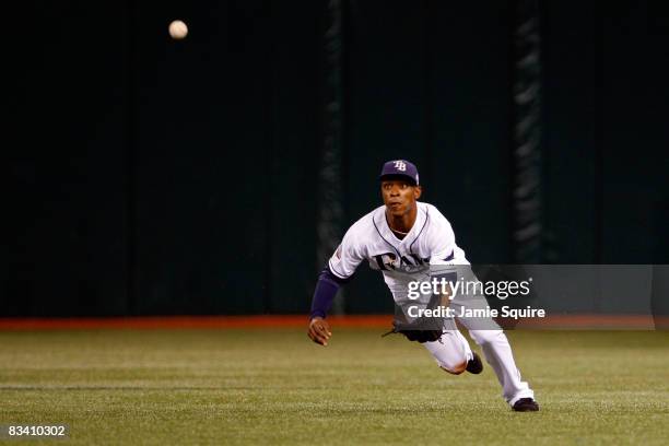 Upton of the Tampa Bay Rays can't make a play on a single hit by Greg Dobbs of the Philadelphia Phillies in the top of the sixth inning during game...