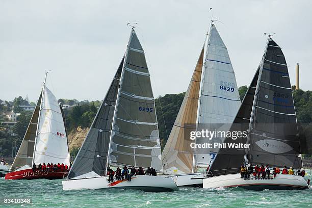 Flotilla of yachts head out to sea at the start of the Coastal Classic Yacht Race in Auckland Harbour on October 24, 2008 in Auckland, New Zealand....