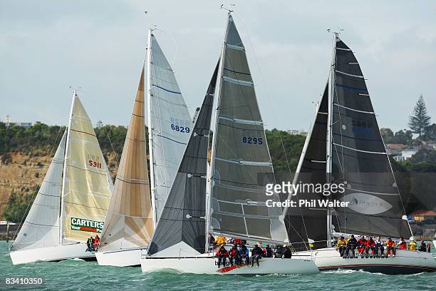 Flotilla of yachts head out to sea at the start of the Coastal Classic Yacht Race in Auckland Harbour on October 24, 2008 in Auckland, New Zealand....