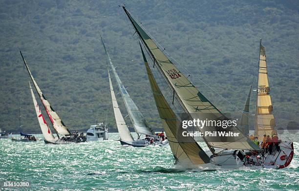 Flotilla of yachts head out to sea at the start of the Coastal Classic Yacht Race in Auckland Harbour on October 24, 2008 in Auckland, New Zealand....