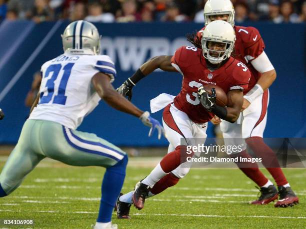 Running back Andre Ellington of the Arizona Cardinals carries the ball in the first quarter of the 2017 Pro Football Hall of Fame Game on August 3,...