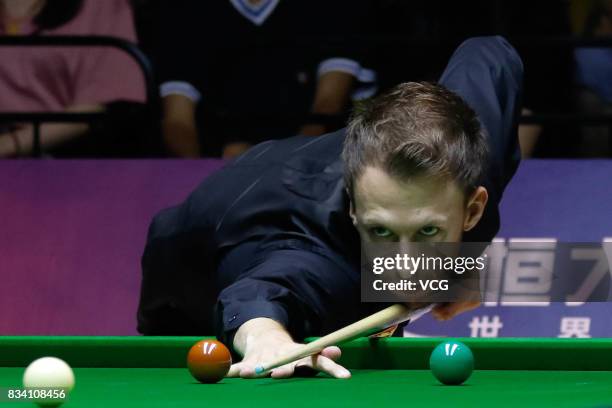 Judd Trump of England plays a shot during his first round match against Daniel Wells of Wales on day two of Evergrande 2017 World Snooker China...