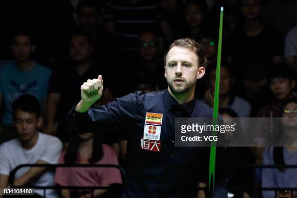 Judd Trump of England reacts during his first round match against Daniel Wells of Wales on day two of Evergrande 2017 World Snooker China Champion at...