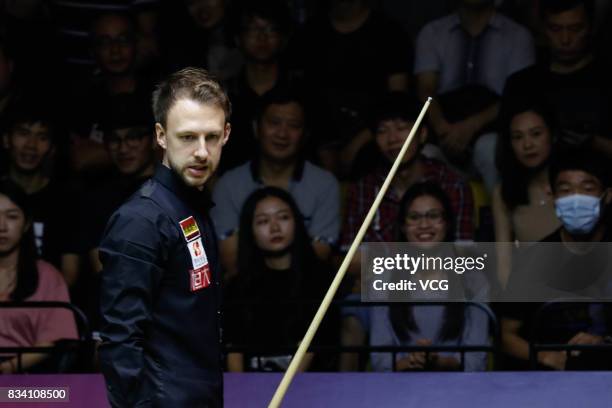 Judd Trump of England reacts during his first round match against Daniel Wells of Wales on day two of Evergrande 2017 World Snooker China Champion at...