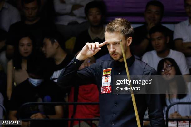 Judd Trump of England reacts during his first round match against Daniel Wells of Wales on day two of Evergrande 2017 World Snooker China Champion at...