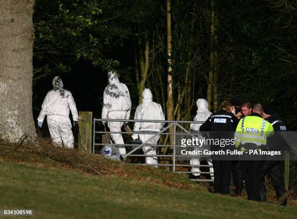 Police forensic officers search an area of woodland near the home of missing make-up artist Diane Chenery-Wickens at Duddleswell, near Uckfield, East...