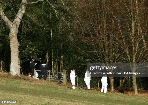 Police forensic officers search an area of woodland near the home of missing make-up artist Diane Chenery-Wickens at Duddleswell, near Uckfield, East...