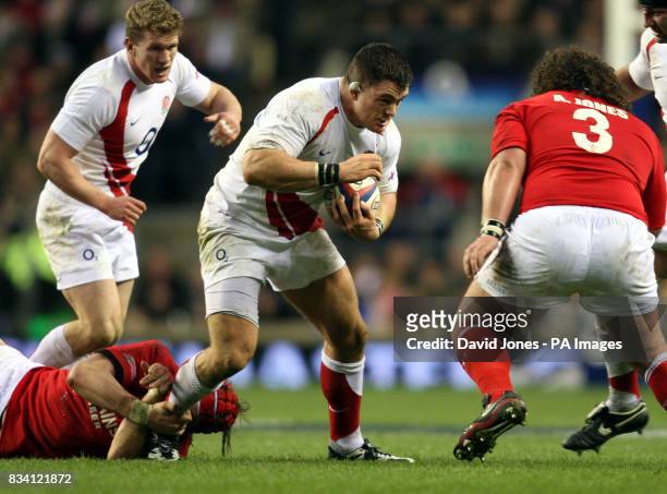 England prop forward Andrew Sheridan prepares to take the tackle from Wales' Adam Jones during the RBS 6 Nations match at Twickenham, London.