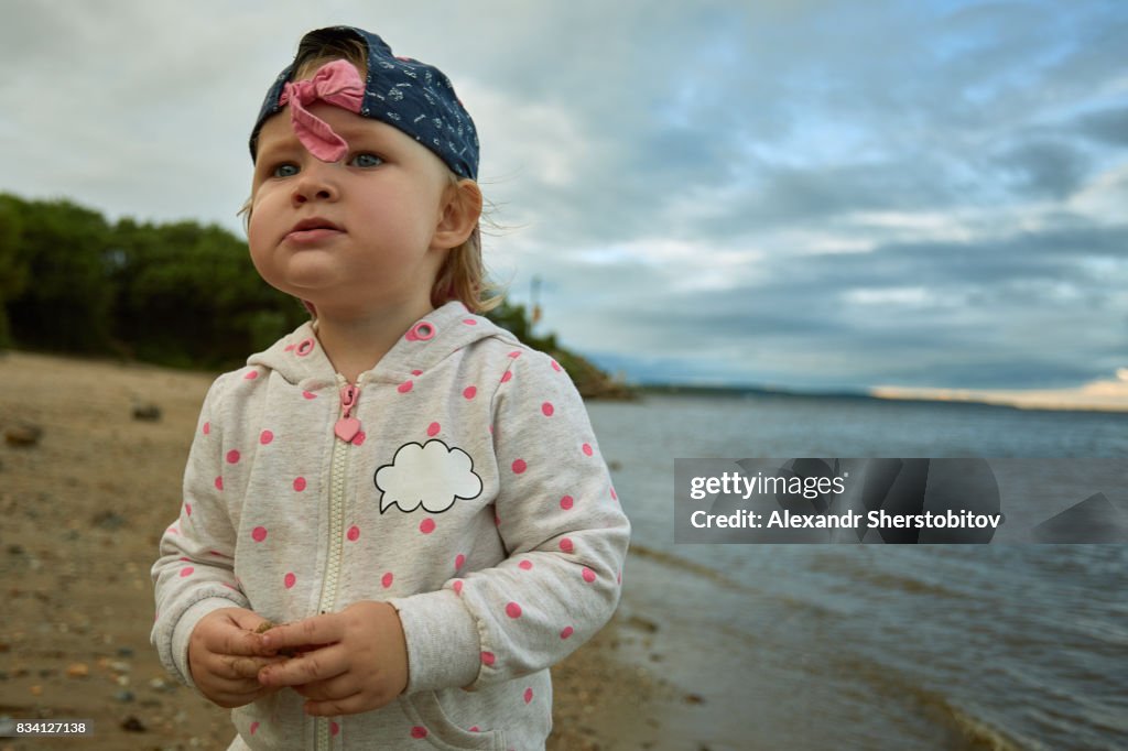 Cute girl at river