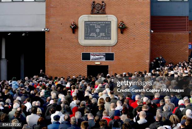 Manchester United fans gather outside Old Trafford, Manchester, for a memorial service remembering the Munich air crash, on the 50th anniversary of...