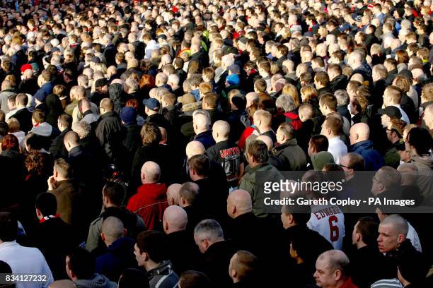 Manchester United fans gather outside Old Trafford, Manchester, for a memorial service remembering the Munich air crash, on the 50th anniversary of...