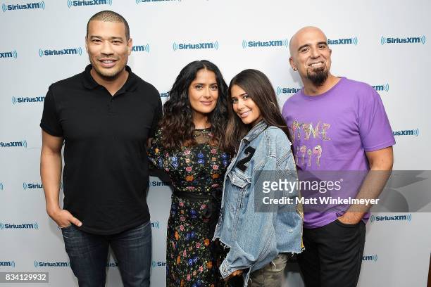 SiriusXM host Michael Yo, actress Salma Hayek, and SiriusXM hosts Symon and Tony Fly pose for a photo as Salma Hayek visits the SiriusXM Studios on...