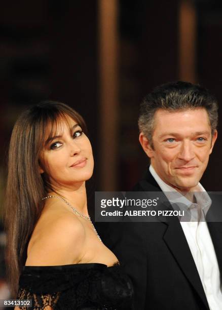 Italian actress Monica Bellucci and her husband, French actor Vincent Cassel arrive for the screening of "L'uomo che ama" on October 23, 2008 at the...