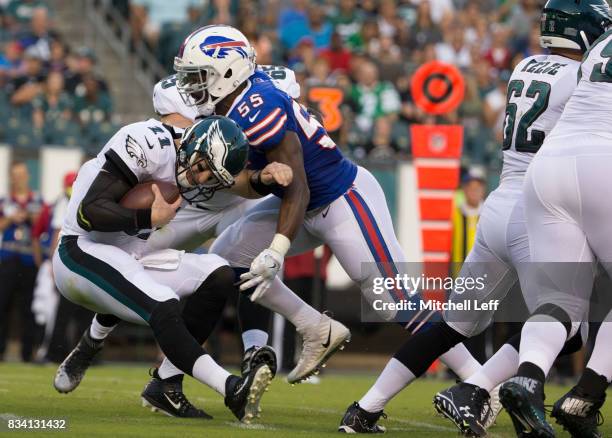 Jerry Hughes of the Buffalo Bills sacks Carson Wentz of the Philadelphia Eagles in the first quarter of the preseason game at Lincoln Financial Field...