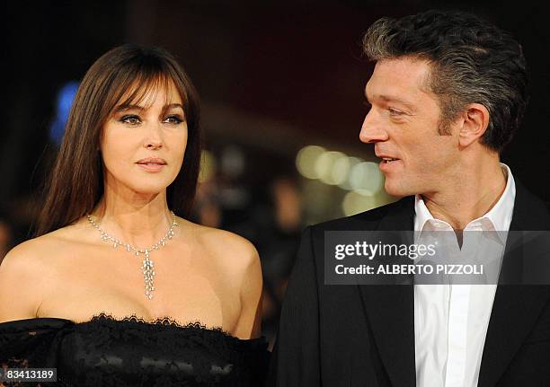 Italian actress Monica Bellucci and her husband, French actor Vincent Cassel arrive for the screening of "L'uomo che ama" on October 23, 2008 at the...