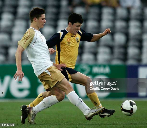 Brady Smith of the Mariners and Brodie Mooy of the Jets contest the ball during the round five National Youth League match between the Central Coast...