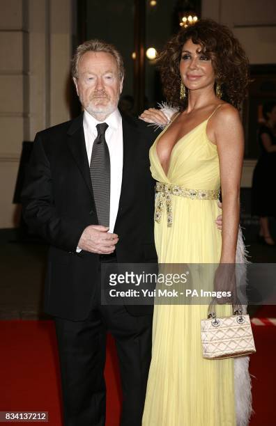 Director Ridley Scott and Giannina Facio arrive for the 2008 Orange British Academy Film Awards at the Royal Opera House in Covent Garden, central...