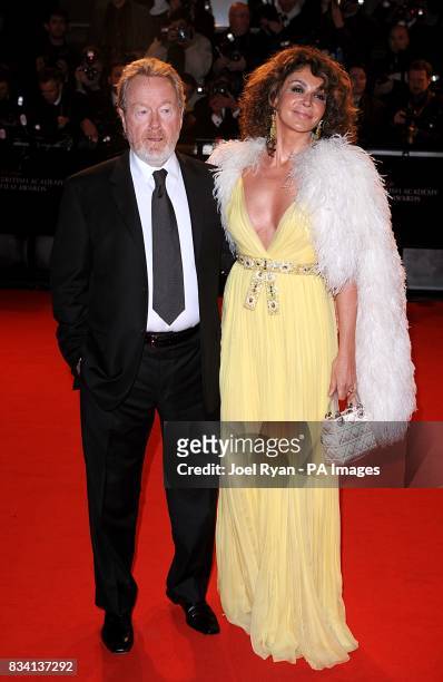 Ridley Scott and Giannina Facio arrive for the 2008 Orange British Academy Film Awards at the Royal Opera House in Covent Garden, central London.