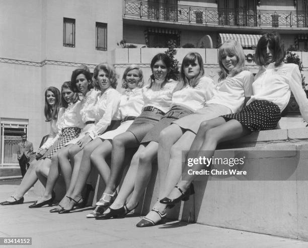 Group of debutantes outside the Dorchester Hotel, London, where they are training to take part in the launch of a new petrol brand from European...