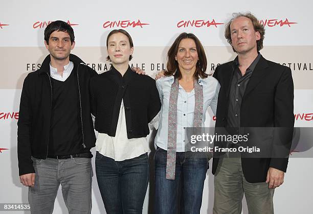 Actor Christoph Bach, actress Franziska Petri, director Connie Walther and actor Ulrich Noethen attend the Long Shadows Photocall during the 3rd Rome...