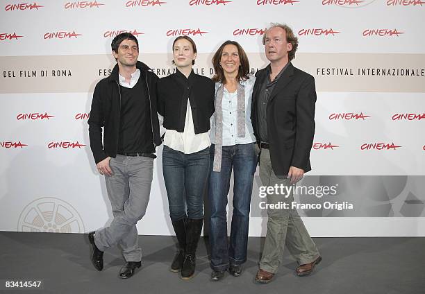 Actor Christoph Bach, actress Franziska Petri, director Connie Walther and actor Ulrich Noethen attend the Long Shadows Photocall during the 3rd Rome...