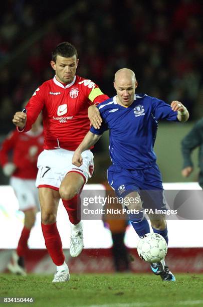 Brann's Eirik Bakke and Everton's Andrew Johnson in action during the UEFA Cup match at the Brann Stadium, Bergen, Norway.