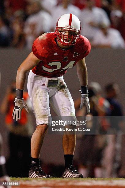Robbie Leonard of the North Carolina State Wolfpack lines up for a play during the game against the Florida State Seminoles at Carter-Finley Stadium...