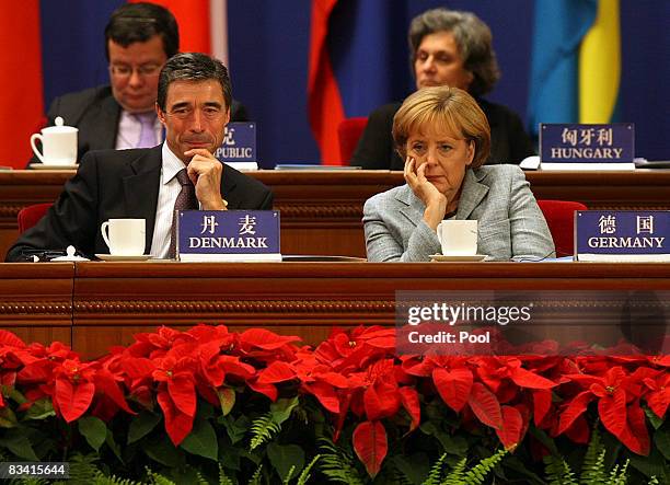 Denmark's Prime Minister Anders Fogh Rasmussen, and German Chancellor Angela Merkel attends the Opening ceremony for the 7th Asia Europe Meeting...