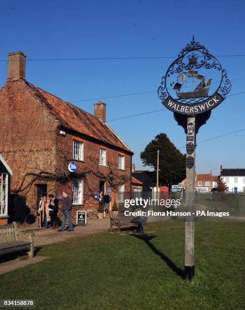 The village green at Walberswick on the Suffolk coast where villagers today formed a human "Save Our Shoreline" to protest at the Department for...