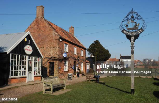 The village green at Walberswick on the Suffolk coast where villagers today formed a human "Save Our Shoreline" to protest at the Department for...