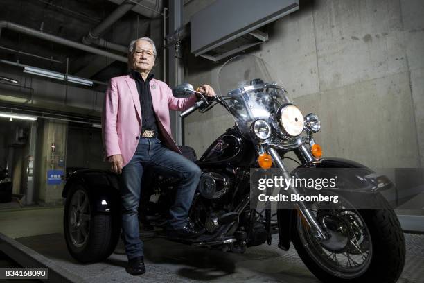 Lawyer Hiroyuki Kawai poses with his Harley-Davidson Inc. Trike motorcycle inside a garage in Tokyo, Japan, on Tuesday, July 25, 2017. Kawai is...