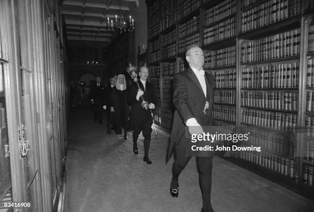 The Speaker's Procession makes its way through the House of Commons in London, 12th May 1981. The Bar Doorkeeper leads the procession, followed by a...