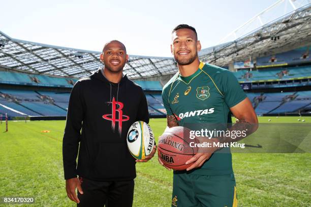 Player Eric Gordon of the Houston Rockets meets Israel Folau of the Wallabies during the Australian Wallabies Captain's Run at ANZ Stadium on August...