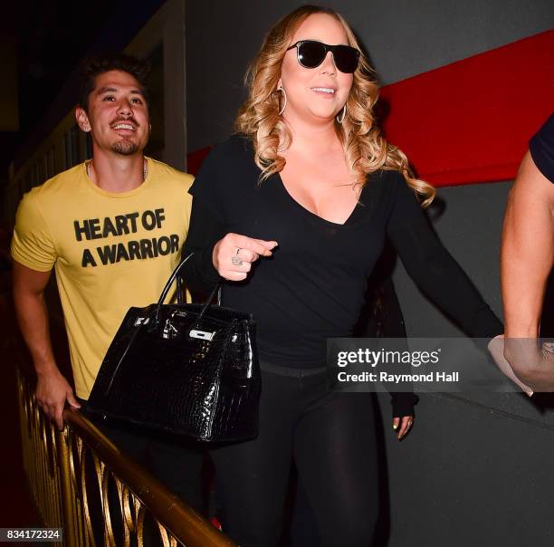 Singer Mariah Carey and Bryan Tanaka are seen out on August 17, 2017 in New York City.
