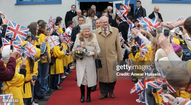 Queen Elizabeth II and President Ivan Gasparovic leave the ice hockey stadium on the second day of a tour of Slovakia on October 24, 2008 in...